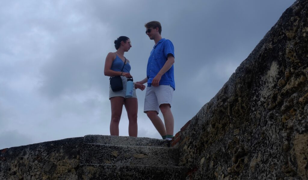 Two people on a wall
