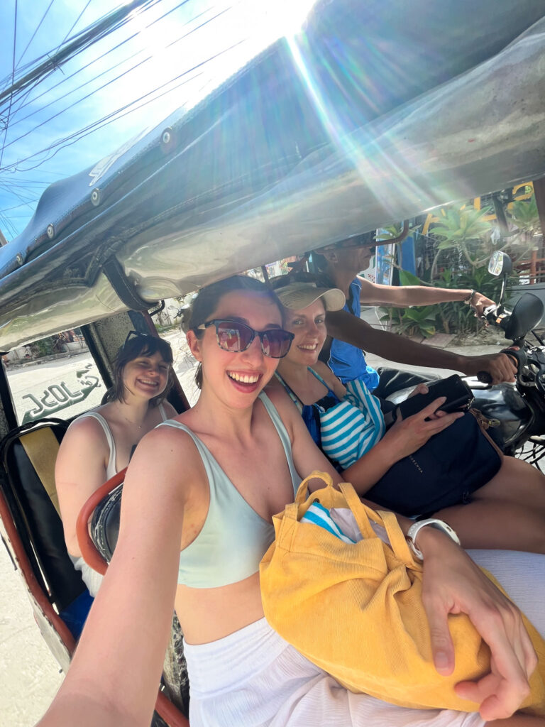 Three Girls Riding a Tricycle - one of the best things to do in Moalboal