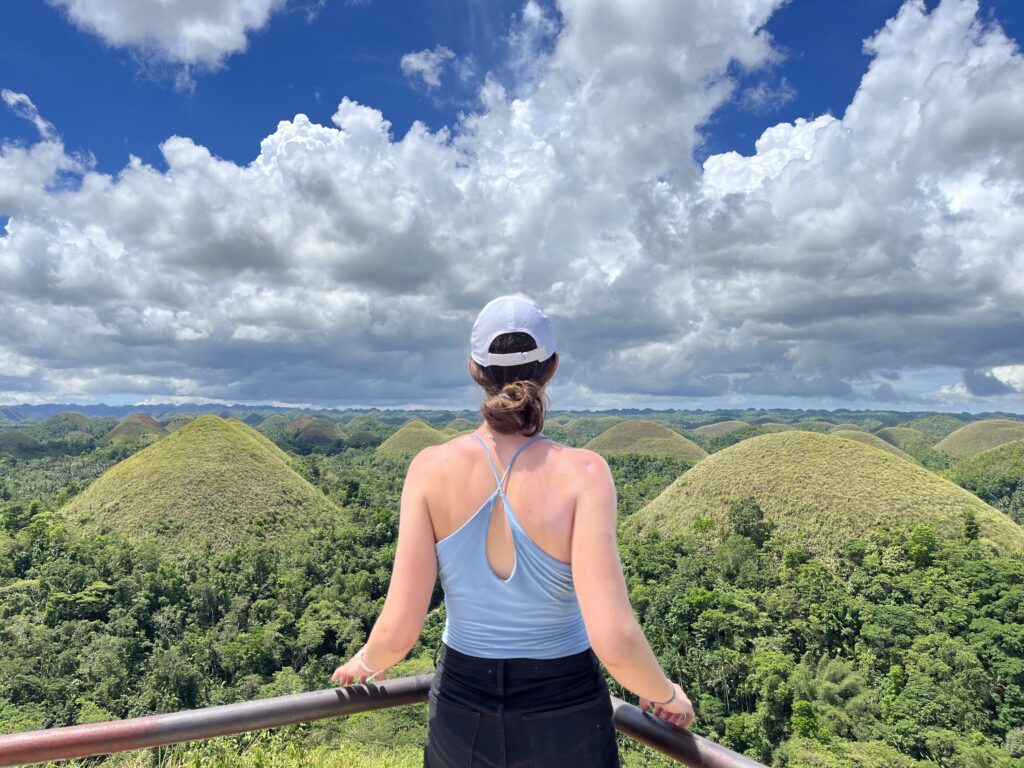 Woman Staring Out at the Chocolate Hills of Bohol