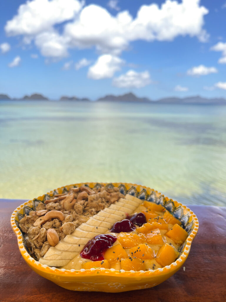 Smoothie bowl with a view of the ocean