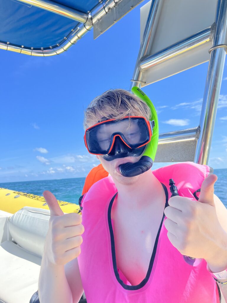 Man with a life vest and snorkel mask